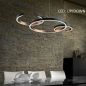 Preview: Dining table pendant lamp Hug with 3 rings in black/copper leaf shining up and down