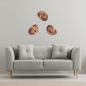 Preview: Three glass wall lights in copper arranged in a group above the couch