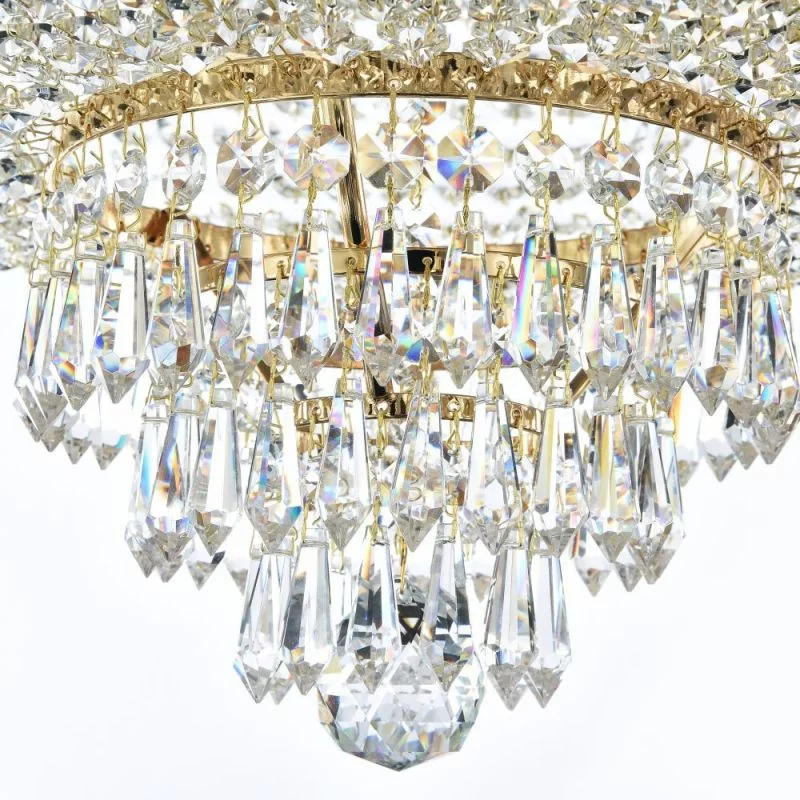 With pointed elongated crystals and a crystal ball at the end