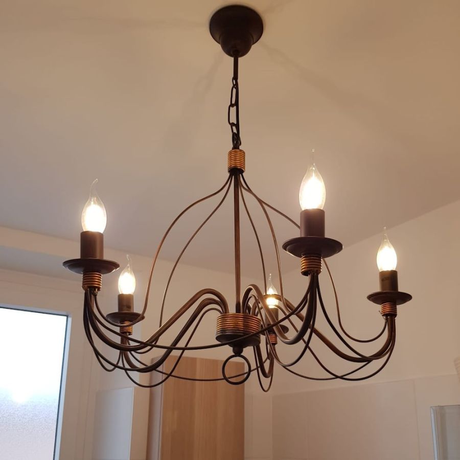 Chandelier hand-painted in rust with antique effect