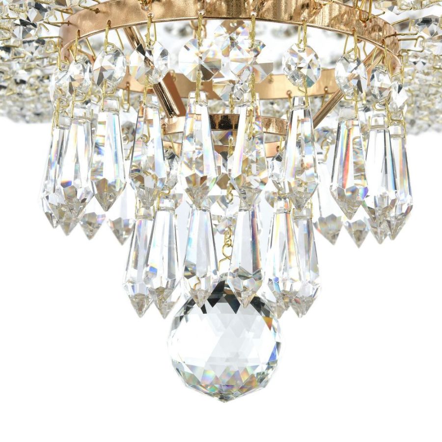 With pointed elongated crystals and a crystal ball at the end